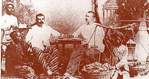 http://www.asiawelcome.com/Batik_04.html Dutch entrepreneurs settled in Indonesia, wearing batik clothes.